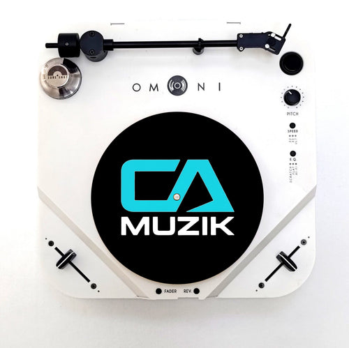 Black CA Muzik slipmat with blue CA logo and white MUZIK lettering, shown on a white turntable
